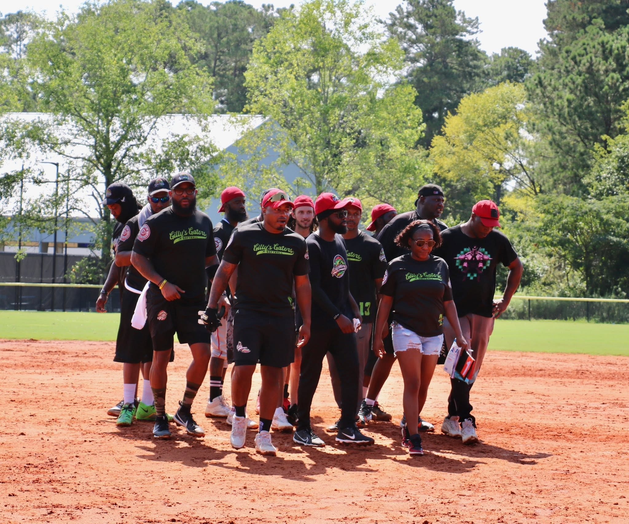 Gilly's Gators team walking onto the field