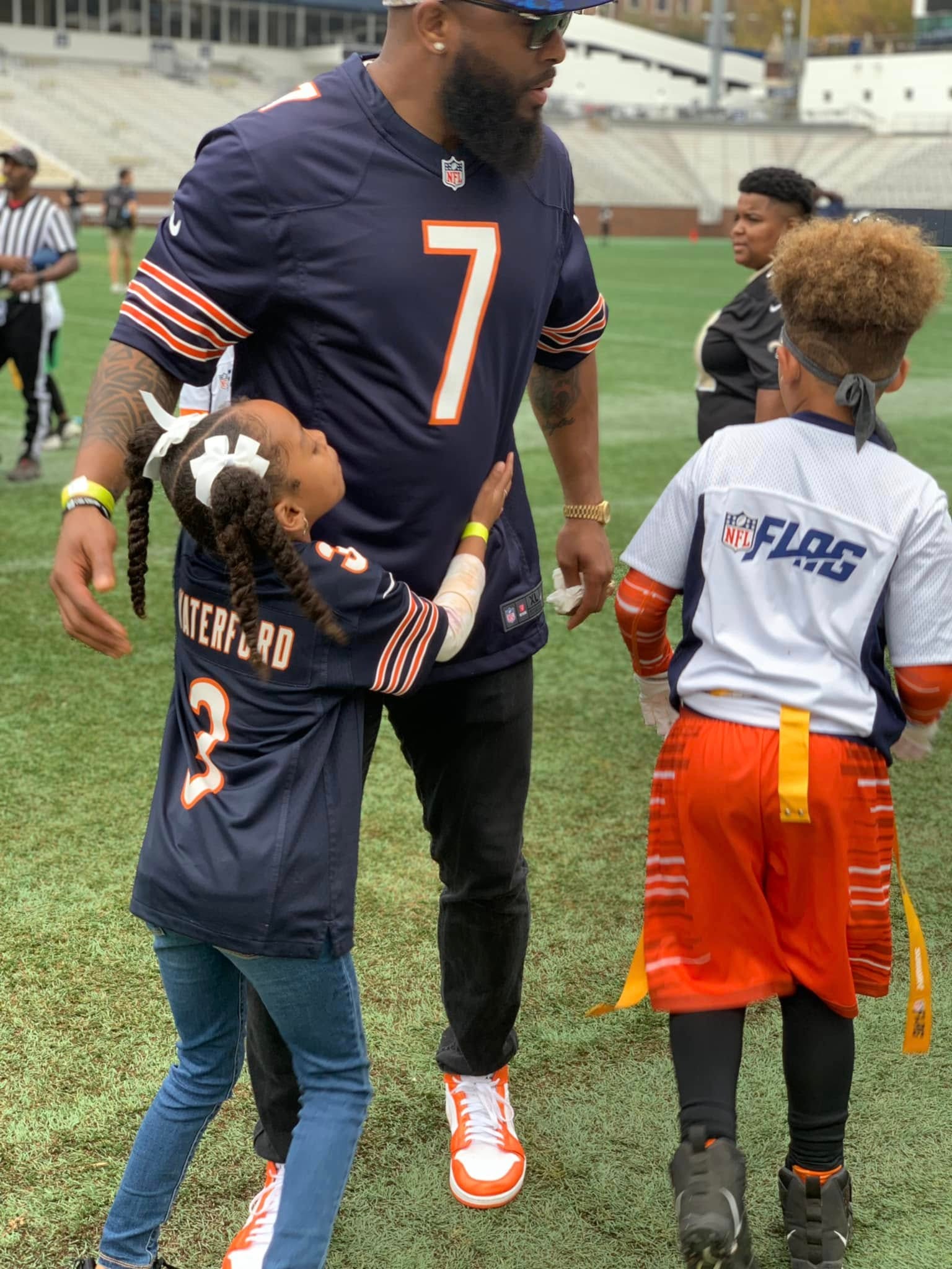 Jean-Paul Waterford in Bears #7 jersey with player at Bobby Dodd Stadium