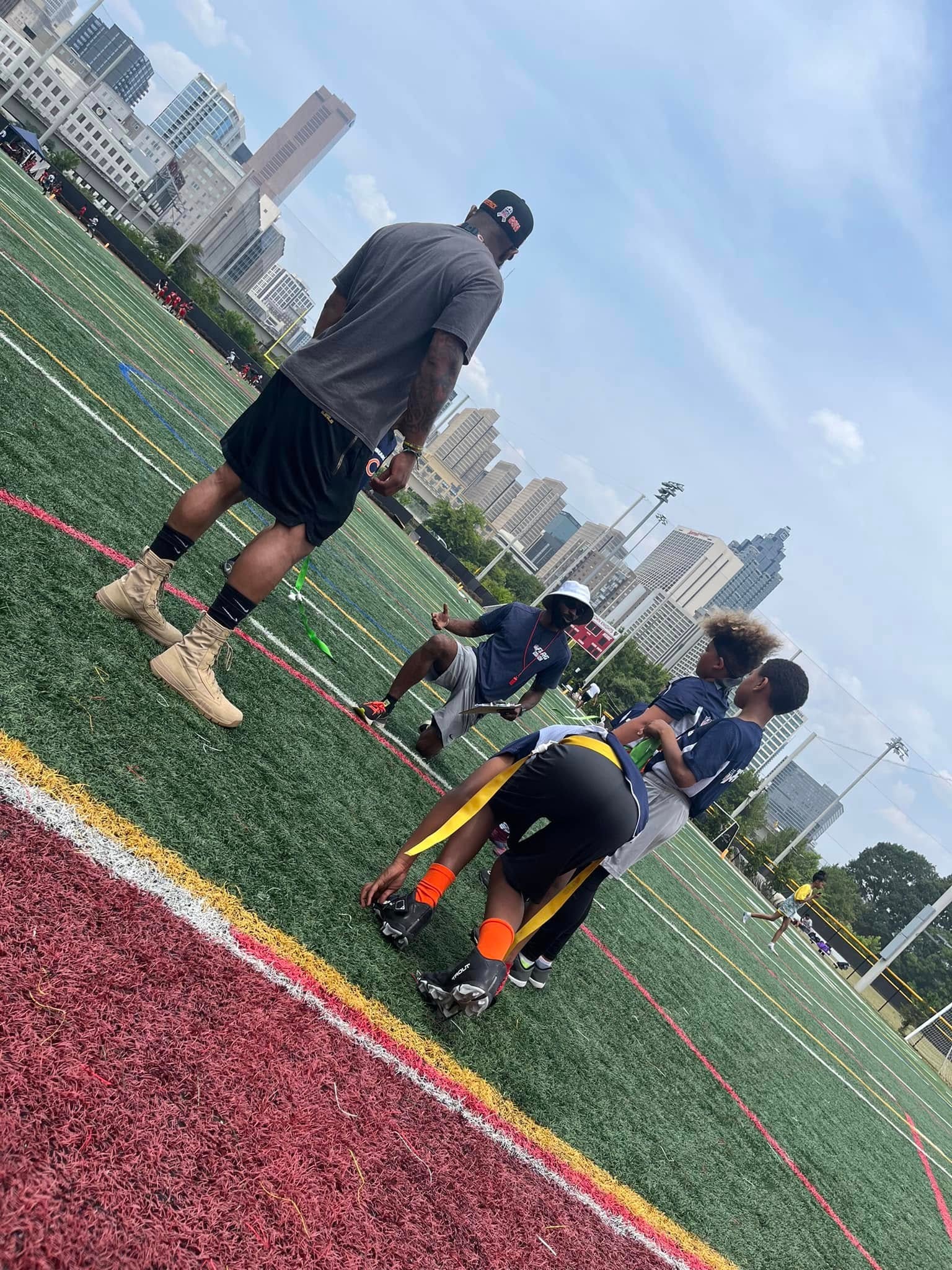 Jean-Paul Waterford coaching Jett Life YFF with Atlanta skyline backdrop
