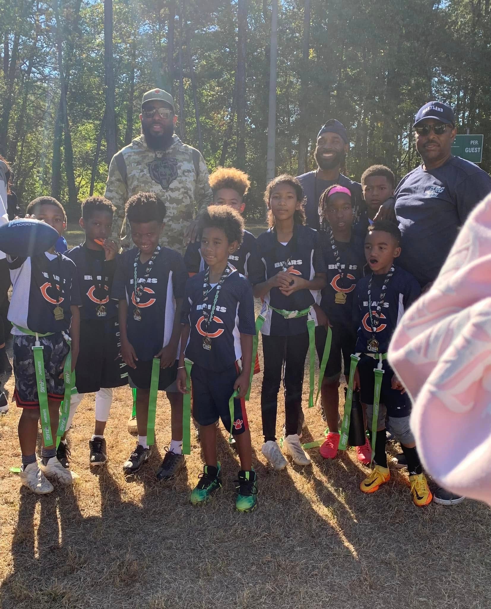 Bears team with medals outdoors — Jett Life YFF awards