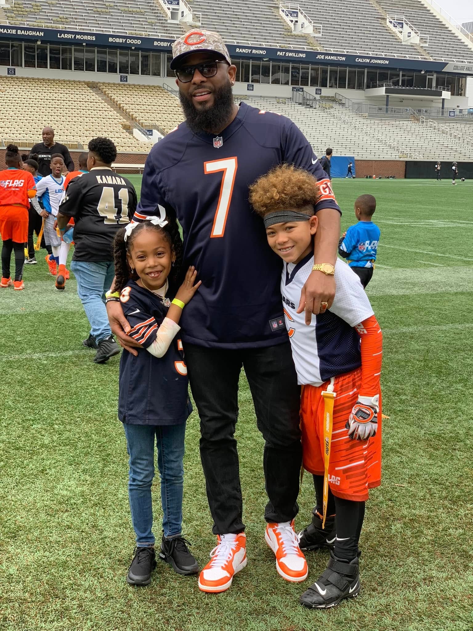 Jean-Paul Waterford with players at Bobby Dodd Stadium — Georgia Tech